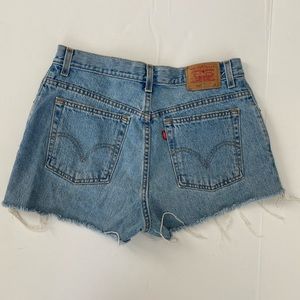 Levi’s 550 distressed denim shorts